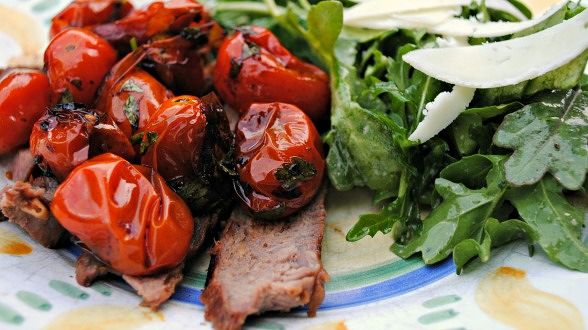 Strip Steak Tagliata with Burst Tomato Pizzaiola and Baby Spicy Greens Salad