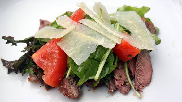 Rosemary-Garlic Steaks with Arugula, Tomatoes and Parmigiano Reggiano